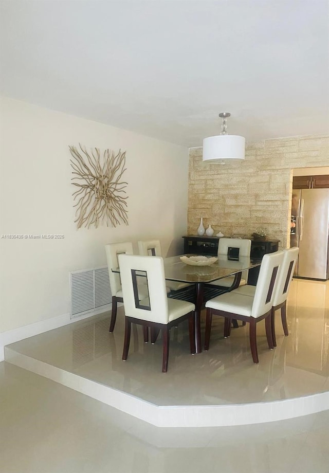 6790 SW 10th Ct, Pembroke Pines, FL 33023 - dining space featuring baseboards