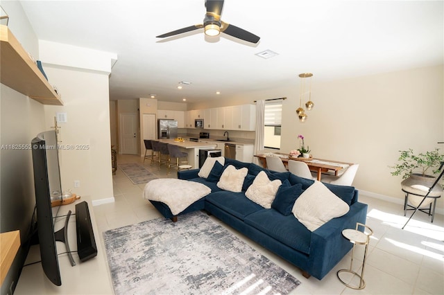 25433 SW 108th Ct, Homestead, FL 33032 - living room with light tile patterned floors, ceiling fan, and recessed lighting