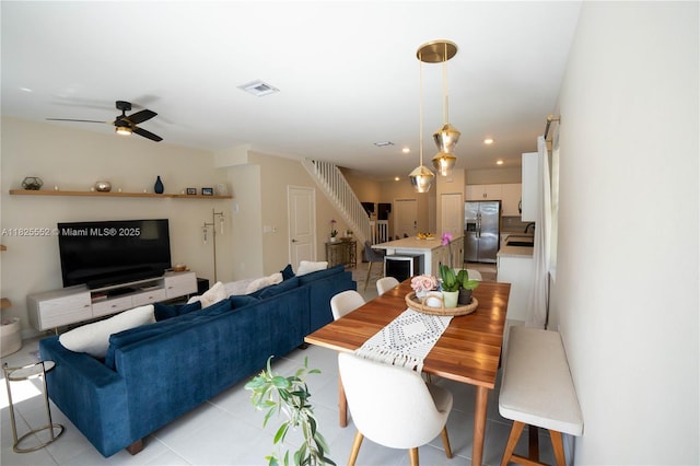 25433 SW 108th Ct, Homestead, FL 33032 - dining area featuring light tile patterned flooring, a ceiling fan, recessed lighting, and stairway