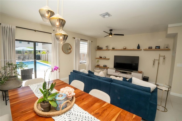 25433 SW 108th Ct, Homestead, FL 33032 - dining area with baseboards and a ceiling fan