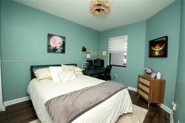 25433 SW 108th Ct, Homestead, FL 33032 - bedroom featuring baseboards and wood finished floors