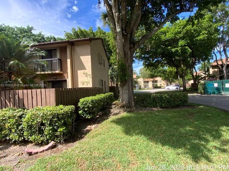 3845 Cocoplum Cir Unit 3597, Coconut Creek, FL 33063 - view of property exterior with stucco siding