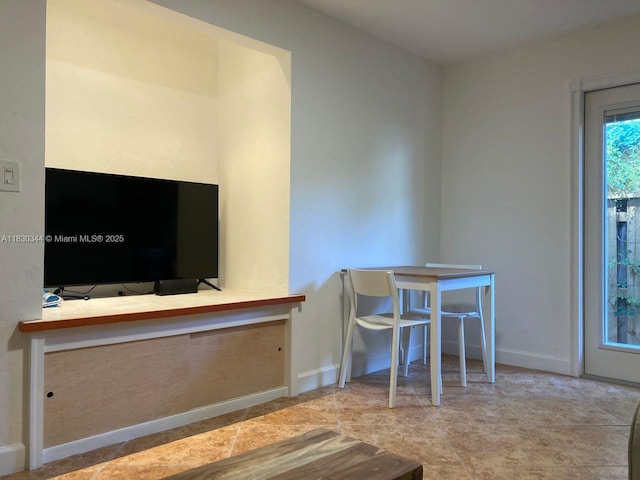 2519 Washington St, Hollywood, FL 33020 - dining space featuring baseboards