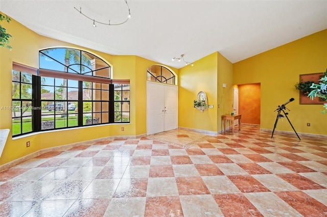 450 NW 195th Ave, Pembroke Pines, FL 33029 - foyer entrance featuring high vaulted ceiling and rail lighting