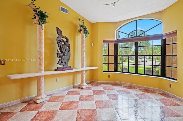 450 NW 195th Ave, Pembroke Pines, FL 33029 - foyer entrance featuring vaulted ceiling and baseboards