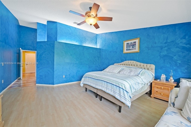450 NW 195th Ave, Pembroke Pines, FL 33029 - bedroom with wood finished floors and a ceiling fan