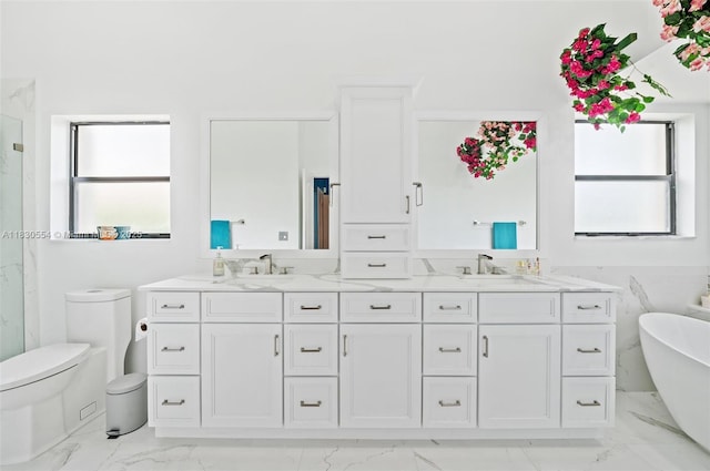450 NW 195th Ave, Pembroke Pines, FL 33029 - bathroom featuring marble look tiles, double vanity, a soaking tub, and a marble finish shower