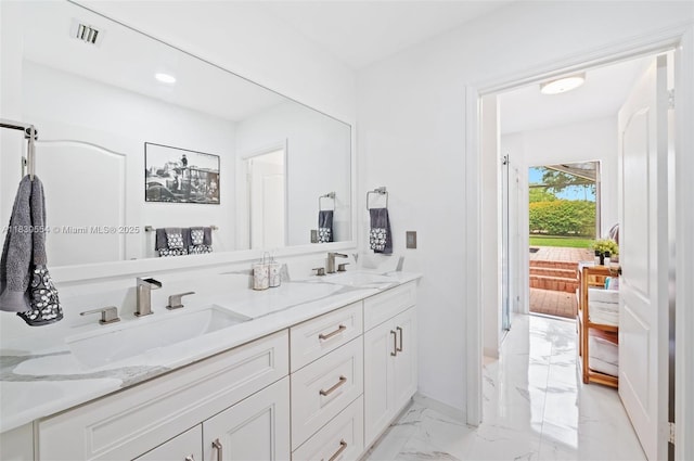 450 NW 195th Ave, Pembroke Pines, FL 33029 - bathroom featuring marble look tiles and double vanity