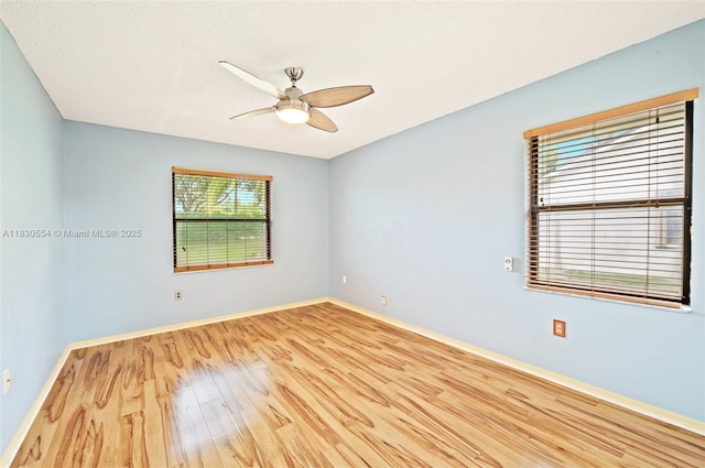 450 NW 195th Ave, Pembroke Pines, FL 33029 - spare room featuring wood finished floors and a ceiling fan