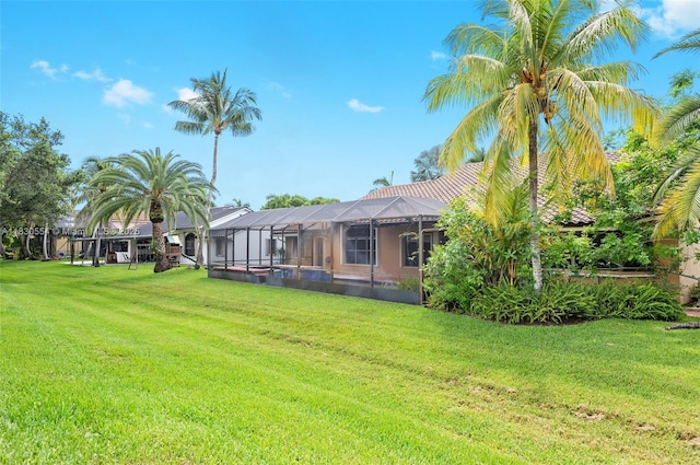 450 NW 195th Ave, Pembroke Pines, FL 33029 - view of green lawn featuring glass enclosure