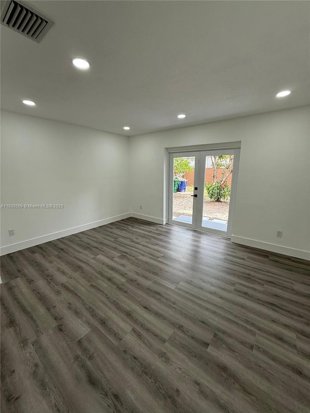 6201 SW 20th Ct, Miramar, FL 33023 - empty room featuring french doors, recessed lighting, and dark wood finished floors