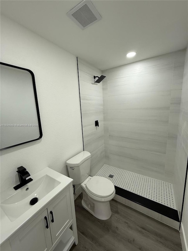 6201 SW 20th Ct, Miramar, FL 33023 - full bath featuring vanity, wood finished floors, tiled shower, and recessed lighting