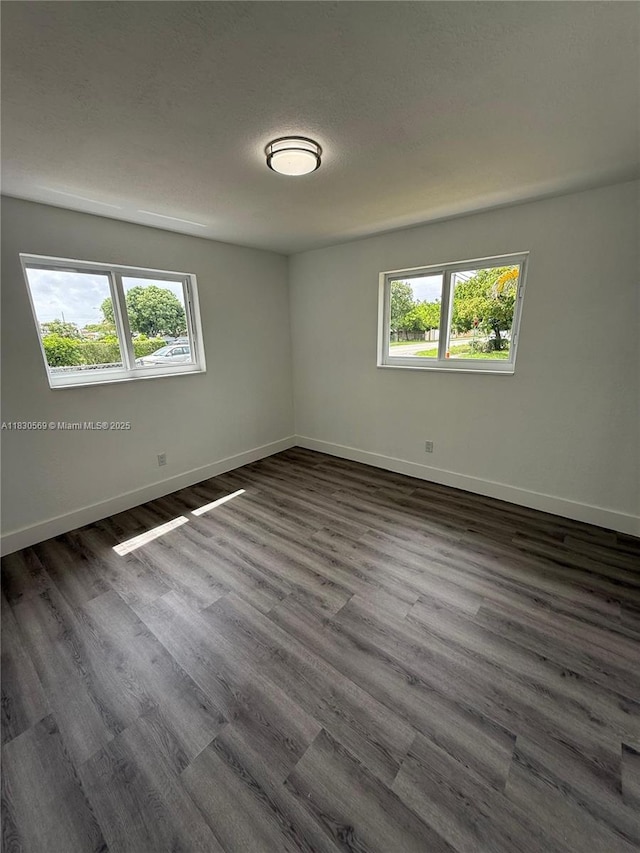 6201 SW 20th Ct, Miramar, FL 33023 - unfurnished room featuring plenty of natural light and dark wood-style floors