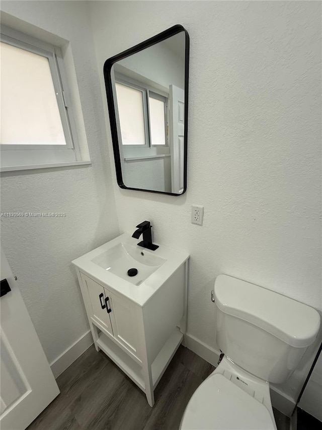 6201 SW 20th Ct, Miramar, FL 33023 - bathroom featuring vanity, wood finished floors, and a textured wall