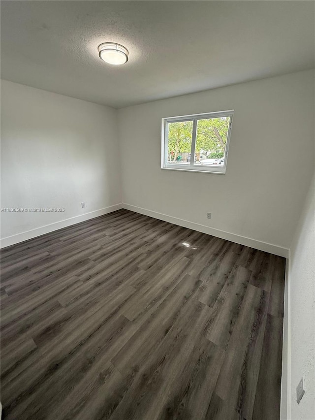 6201 SW 20th Ct, Miramar, FL 33023 - spare room with dark wood-style floors and a textured ceiling