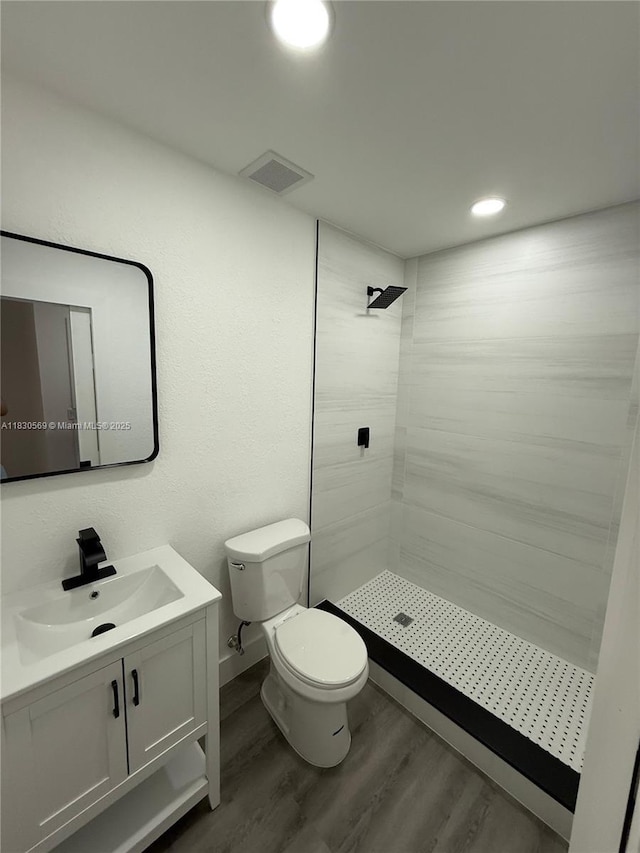 6201 SW 20th Ct, Miramar, FL 33023 - full bath featuring vanity, tiled shower, wood finished floors, and recessed lighting