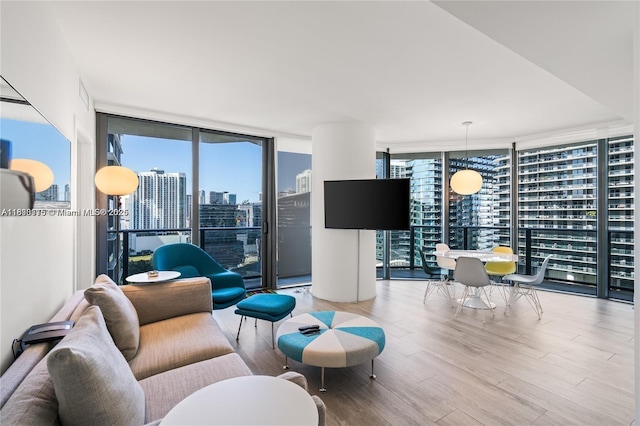 55 SW 9th St Unit 1801, Miami, FL 33130 - living room with floor to ceiling windows and wood finished floors