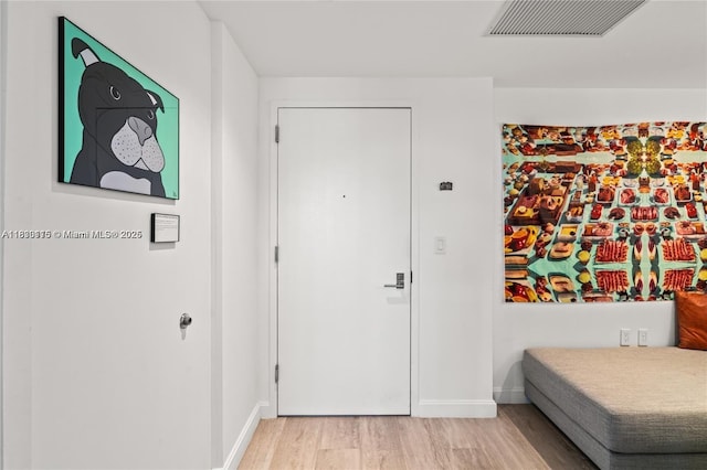 55 SW 9th St Unit 1801, Miami, FL 33130 - bedroom featuring light wood finished floors and baseboards