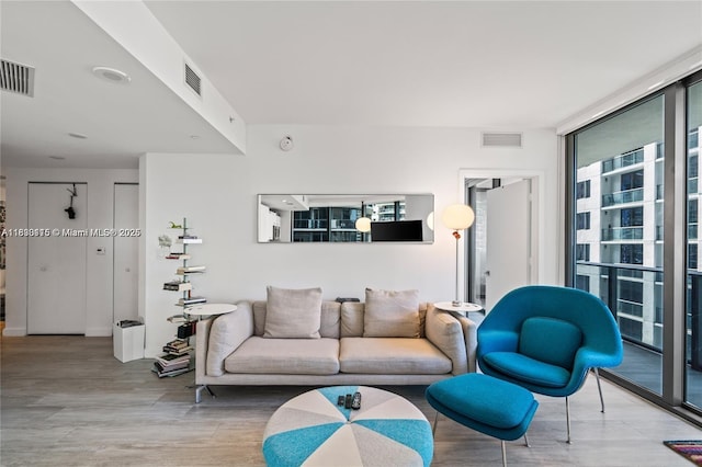 55 SW 9th St Unit 1801, Miami, FL 33130 - living area featuring wood finished floors