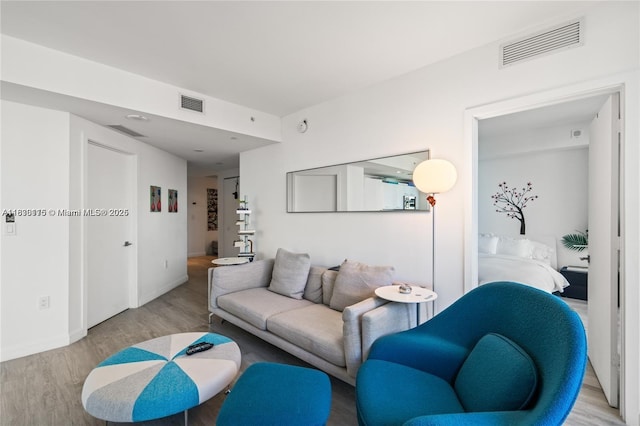 55 SW 9th St Unit 1801, Miami, FL 33130 - living room featuring wood finished floors