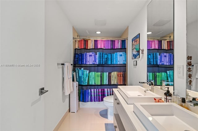 55 SW 9th St Unit 1801, Miami, FL 33130 - bathroom featuring double vanity, tile patterned floors, and curtained shower