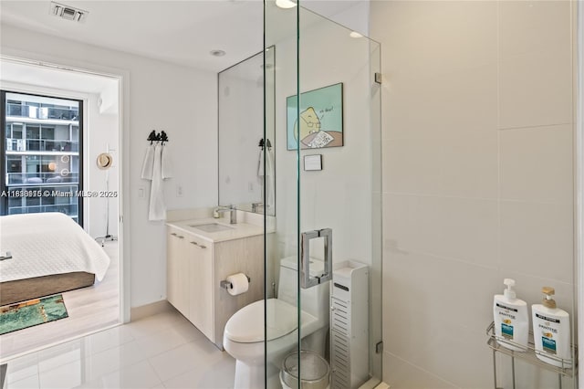 55 SW 9th St Unit 1801, Miami, FL 33130 - bathroom with vanity, a stall shower, and tile patterned floors