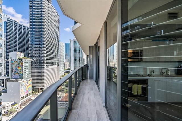 55 SW 9th St Unit 1801, Miami, FL 33130 - balcony with a city view and a sink