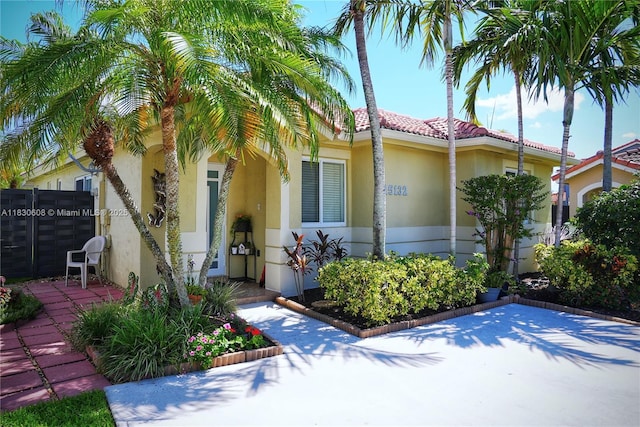 15132 SW 140th Ter, Miami, FL 33196 - mediterranean / spanish-style house featuring stucco siding and a patio area