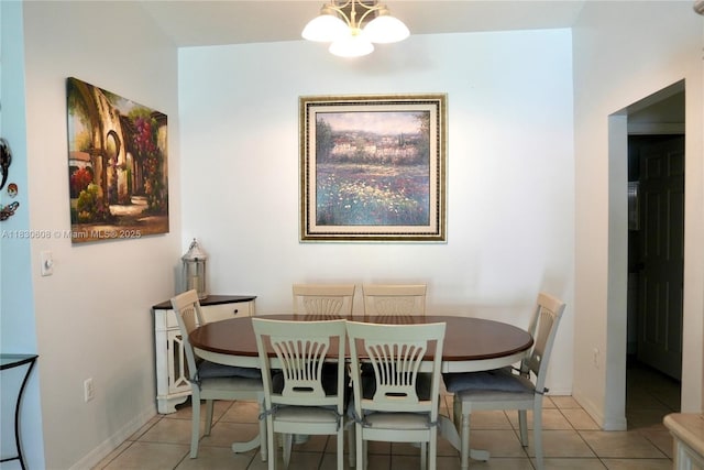 15132 SW 140th Ter, Miami, FL 33196 - dining space with light tile patterned floors and a chandelier