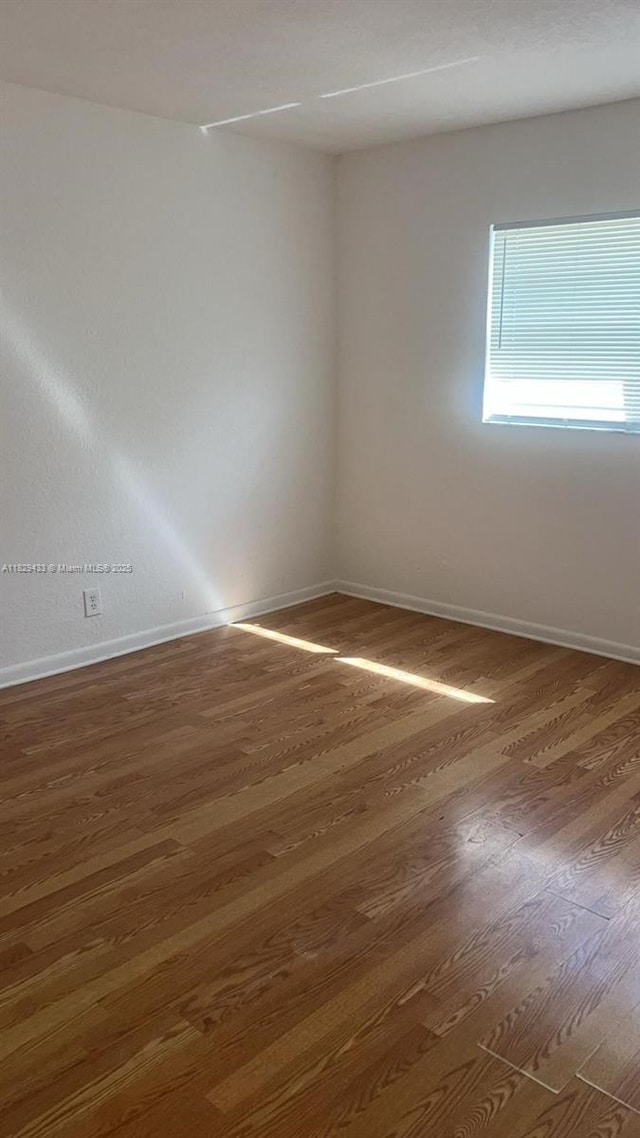 4820 NW 9th Dr Unit 4820, Plantation, FL 33317 - unfurnished room with wood finished floors and baseboards