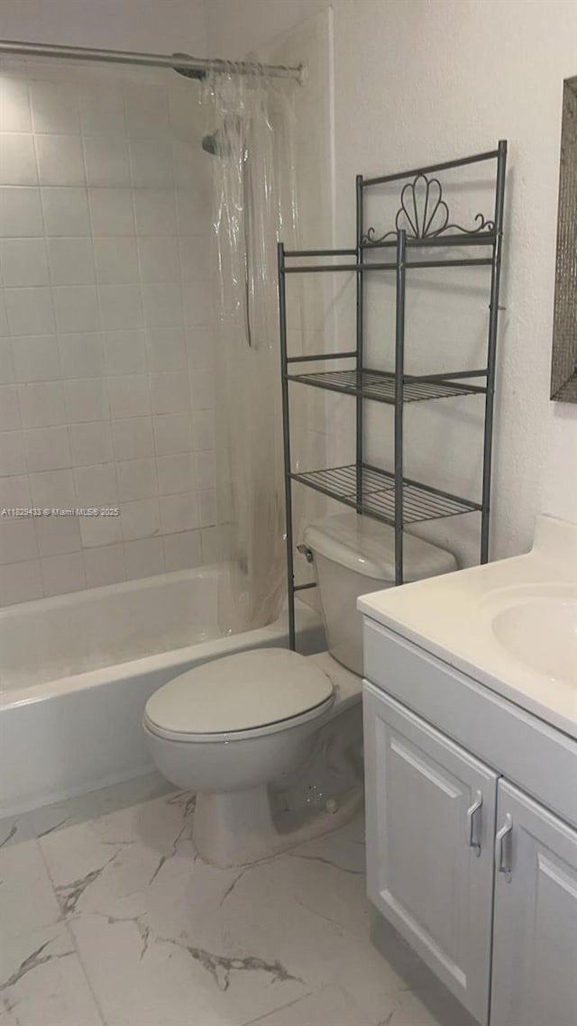 4820 NW 9th Dr Unit 4820, Plantation, FL 33317 - full bathroom featuring vanity, shower / bath combo with shower curtain, marble finish floors, and a textured wall