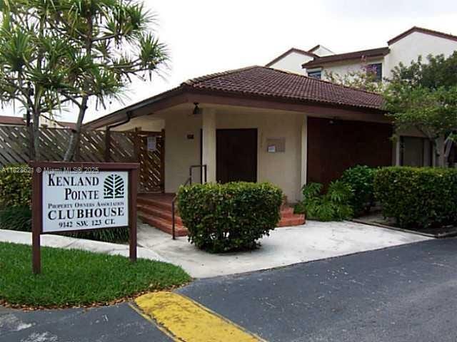 9015 SW 125th Ave Unit N406, Miami, FL 33186 - exterior space featuring stucco siding and a tiled roof
