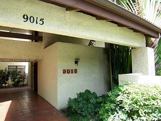 9015 SW 125th Ave Unit N406, Miami, FL 33186 - view of exterior entry with stucco siding