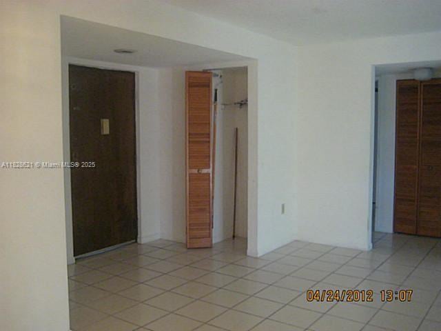 9015 SW 125th Ave Unit N406, Miami, FL 33186 - unfurnished bedroom with light tile patterned floors