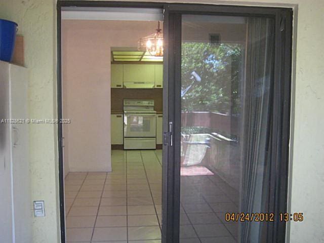 9015 SW 125th Ave Unit N406, Miami, FL 33186 - hall featuring tile patterned floors