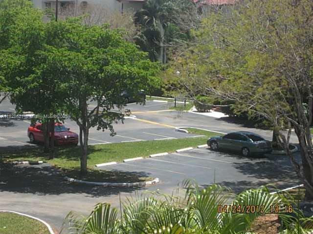 9015 SW 125th Ave Unit N406, Miami, FL 33186 - view of uncovered parking lot