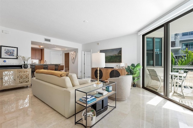 110 Washington Ave Unit 1608, Miami Beach, FL 33139 - living area with light marble finish flooring