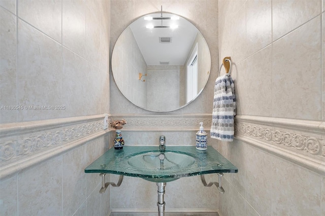 110 Washington Ave Unit 1608, Miami Beach, FL 33139 - bathroom with a sink and tile walls