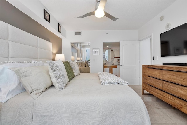 110 Washington Ave Unit 1608, Miami Beach, FL 33139 - bedroom featuring a ceiling fan and ensuite bathroom