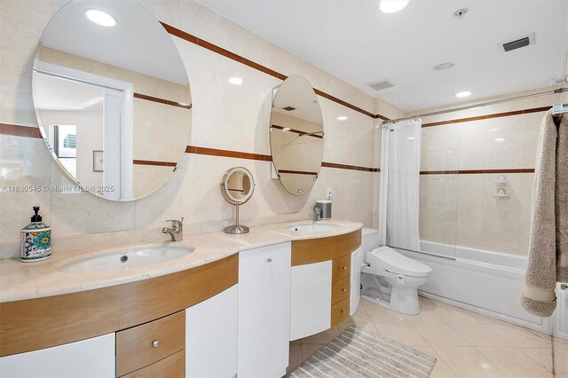 110 Washington Ave Unit 1608, Miami Beach, FL 33139 - bathroom featuring shower / tub combo, double vanity, tile patterned flooring, and tile walls