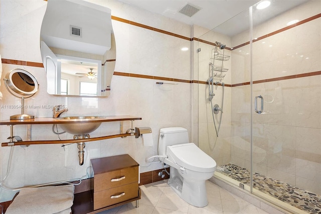 110 Washington Ave Unit 1608, Miami Beach, FL 33139 - bathroom featuring ceiling fan and a stall shower