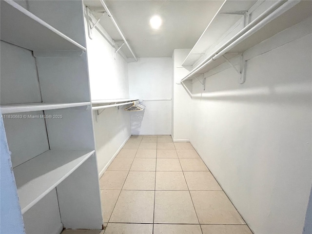 6940 Miami Gardens Dr Unit 1-329, Hialeah, FL 33015 - spacious closet with tile patterned floors