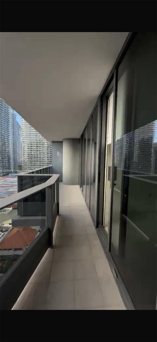 1000 Brickell Plz Unit 2008, Miami, FL 33131 - corridor with light floors