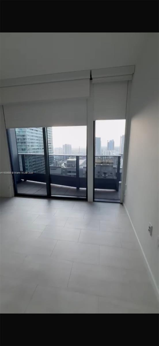 1000 Brickell Plz Unit 2008, Miami, FL 33131 - spare room with a view of city