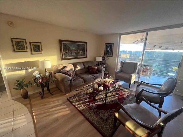 1200 Saint Charles Pl Unit 708, Pembroke Pines, FL 33026 - living room with baseboards and wood finished floors