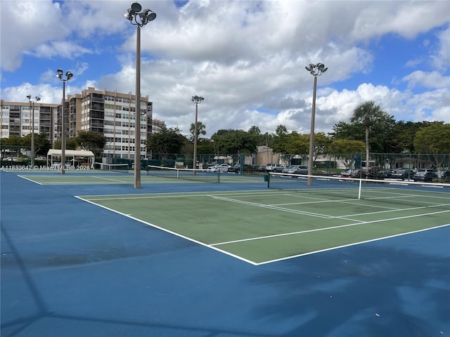 1200 Saint Charles Pl Unit 708, Pembroke Pines, FL 33026 - view of tennis court featuring community basketball court