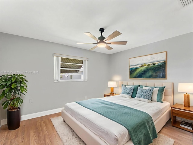 2991 NW 1st Dr, Pompano Beach, FL 33064 - bedroom featuring light wood-style floors and a ceiling fan