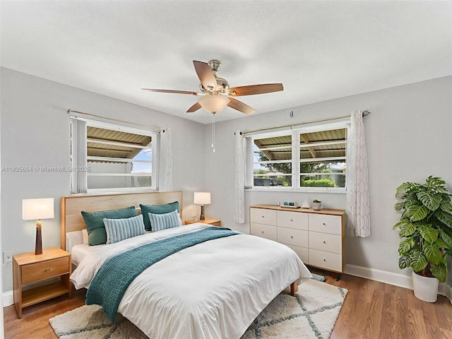 2991 NW 1st Dr, Pompano Beach, FL 33064 - bedroom featuring light wood-style flooring and ceiling fan