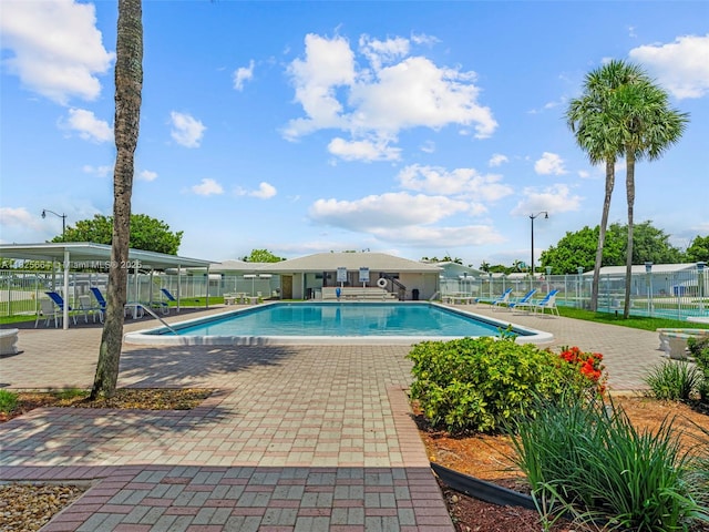 2991 NW 1st Dr, Pompano Beach, FL 33064 - community pool featuring a patio area