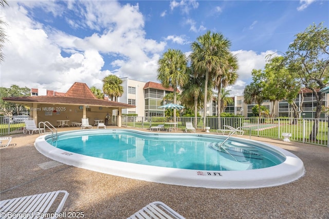 3531 Inverrary Dr Unit 101, Lauderhill, FL 33319 - community pool featuring a patio area